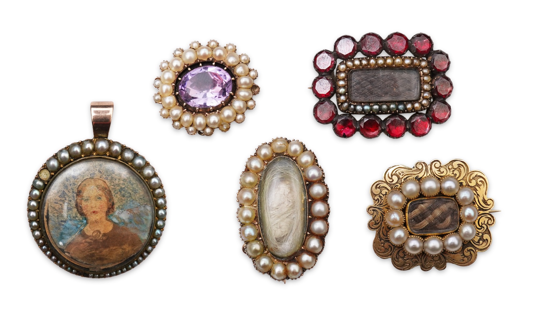 A collection of five Georgian/Victorian brooches, circa 1800-1900